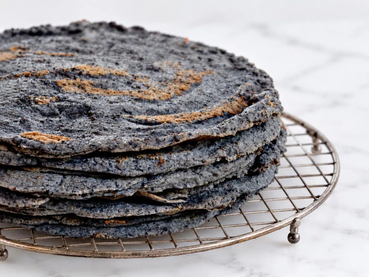 black bean tortillas on a cooling rack