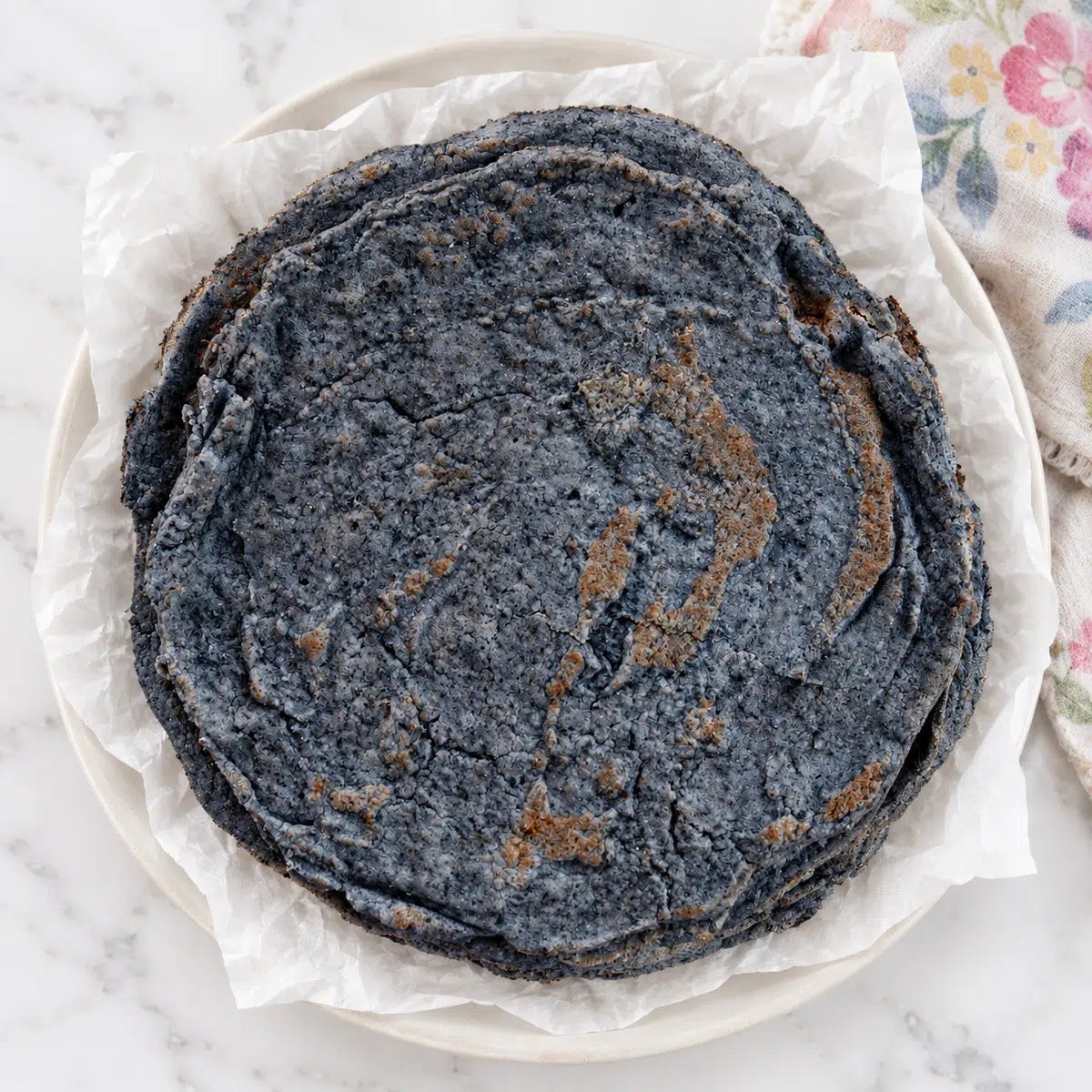 overhead image of black bean tortillas on a plate
