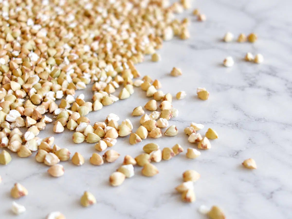 buckwheat roast on a marble surface, ready for making 1-ingredient buckwheat bread