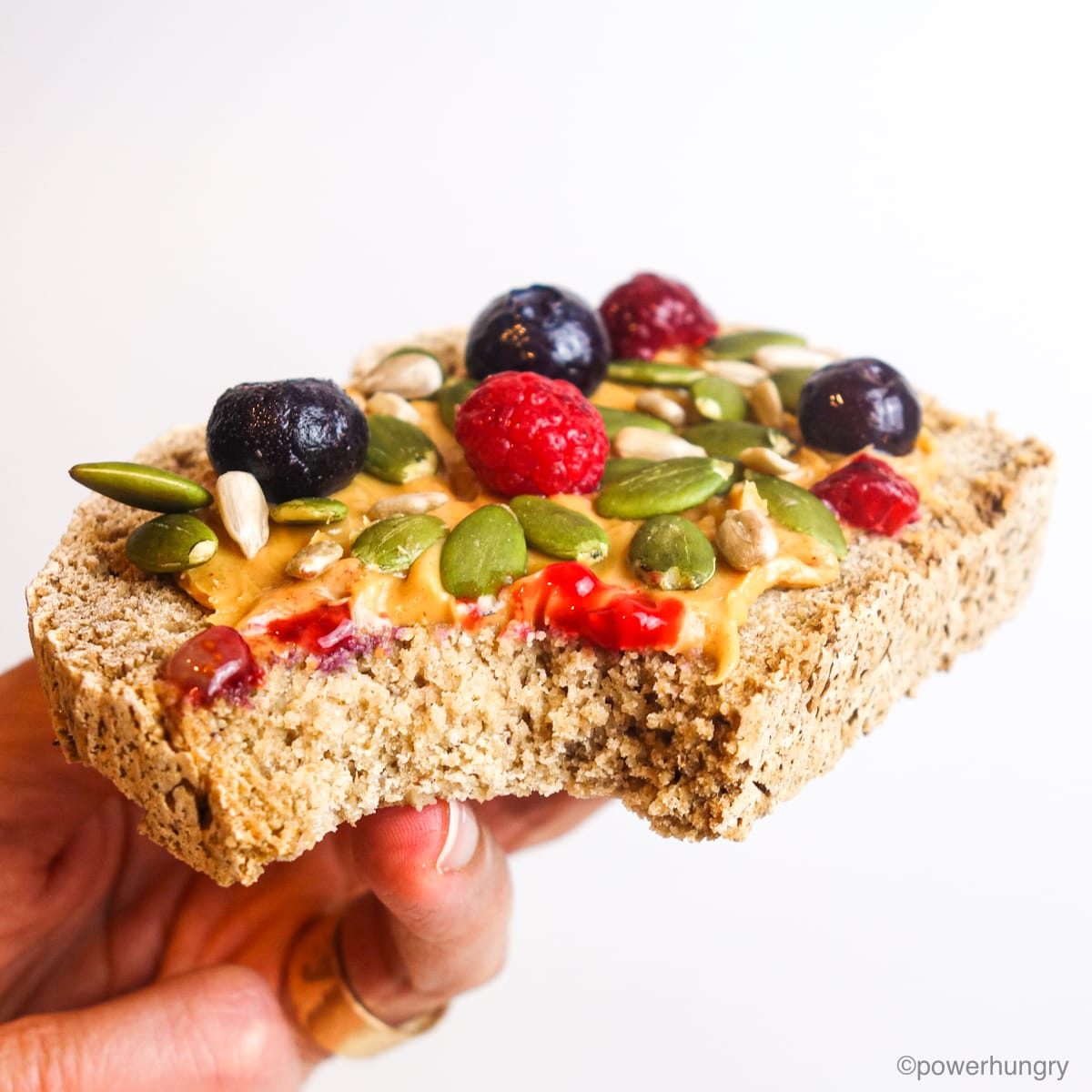 a slice of gluten-free bread with a bite taken out