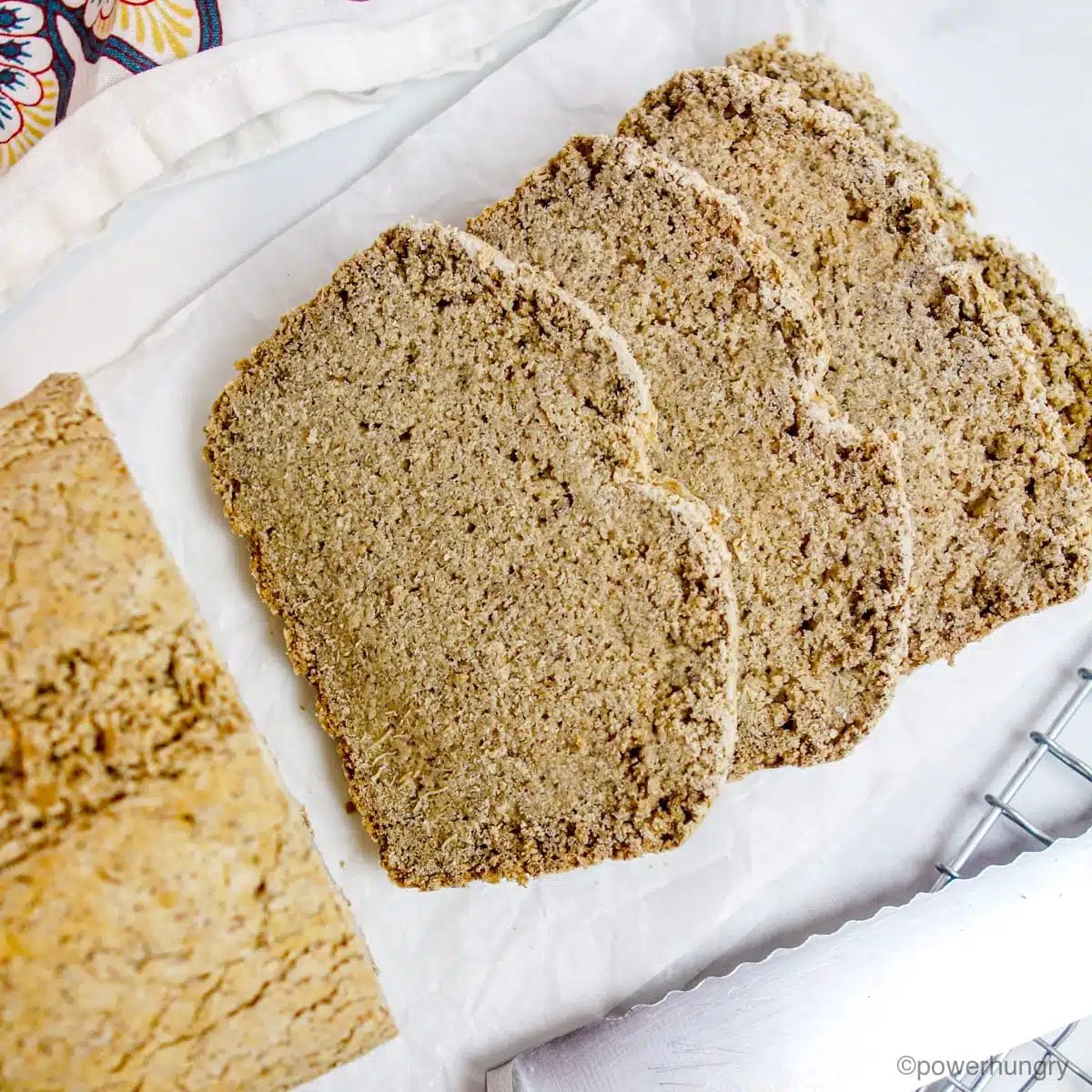 overhead view of a loaf of vegan gluten-free sorghum bread , sliced