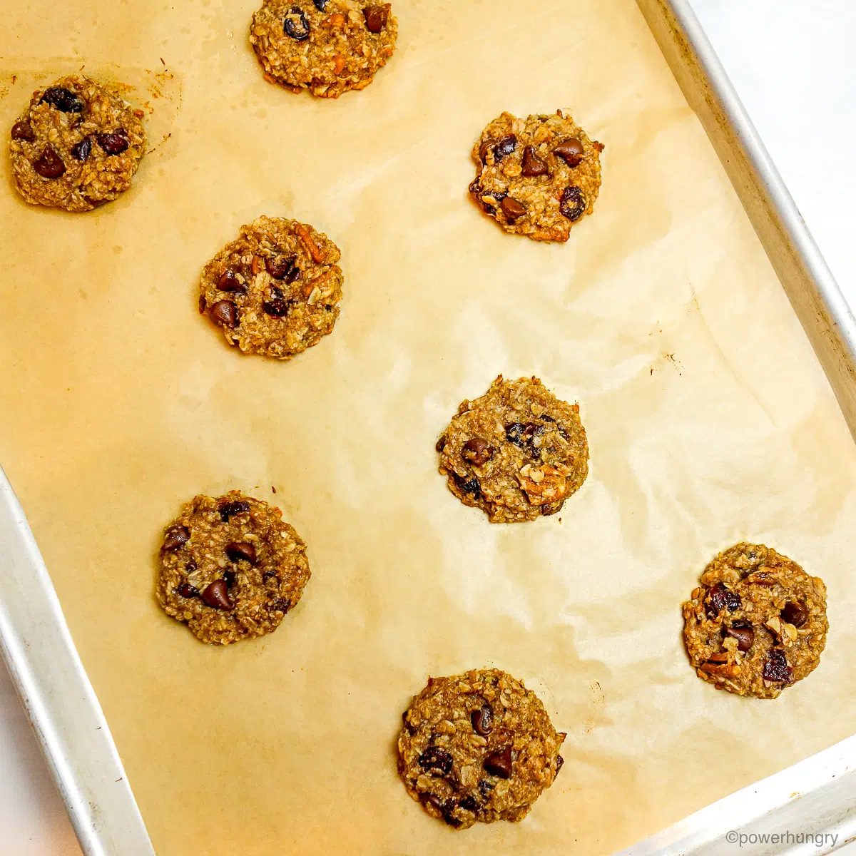 baked banana oat cookies on a cookie sheet