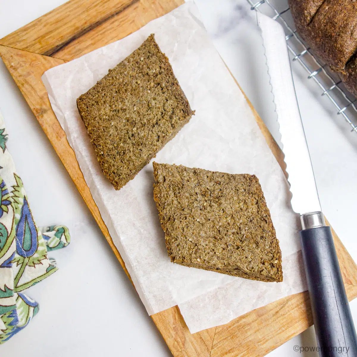 2 ingredient chia seed bread on cutting board, sliced