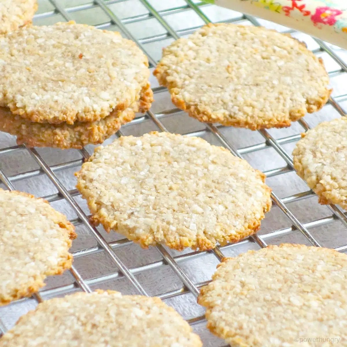 stack of coconut banana cookies on a cooling rack