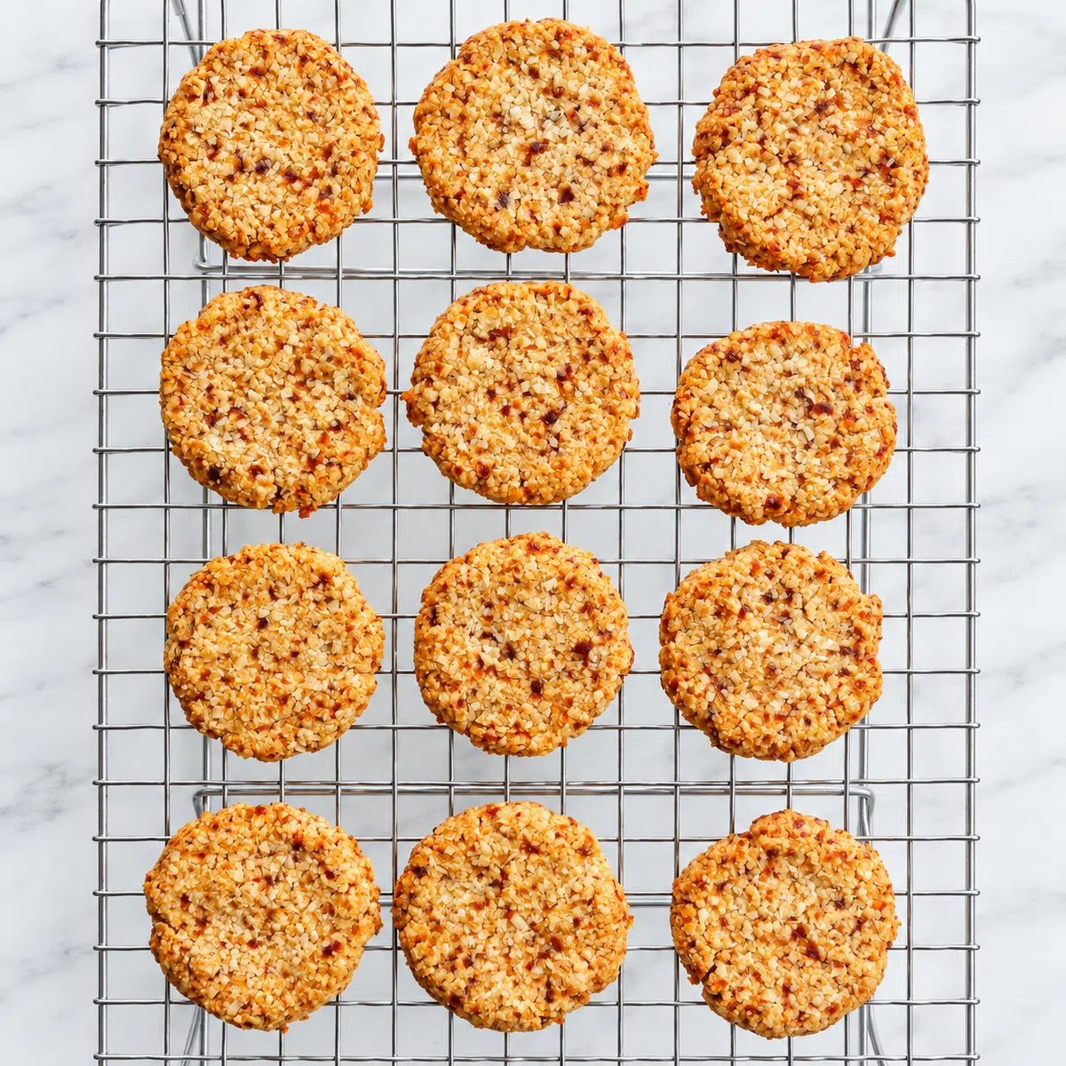 cooling coconut date cookies on wire rack