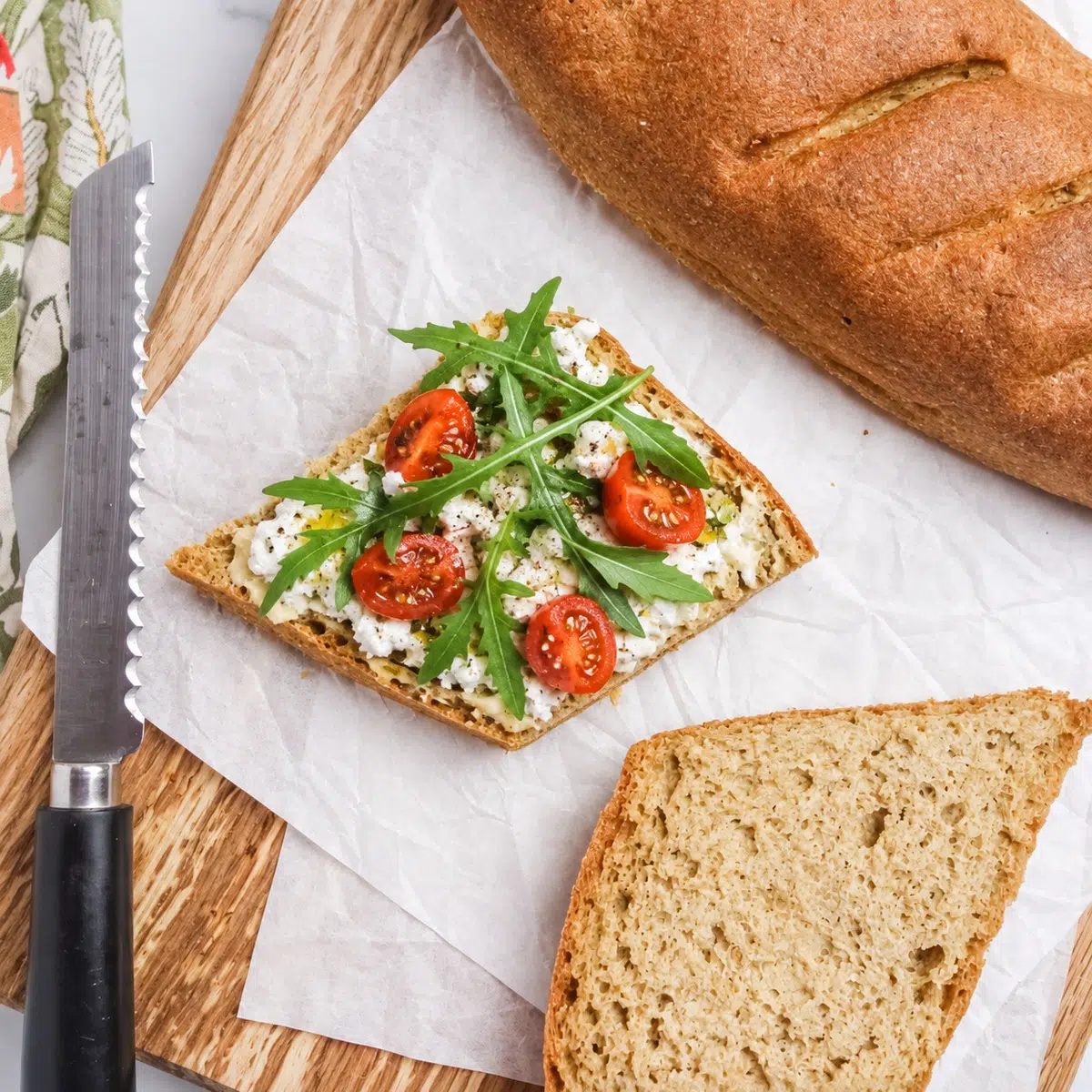 flaxseed bread with arugula and tomato topping