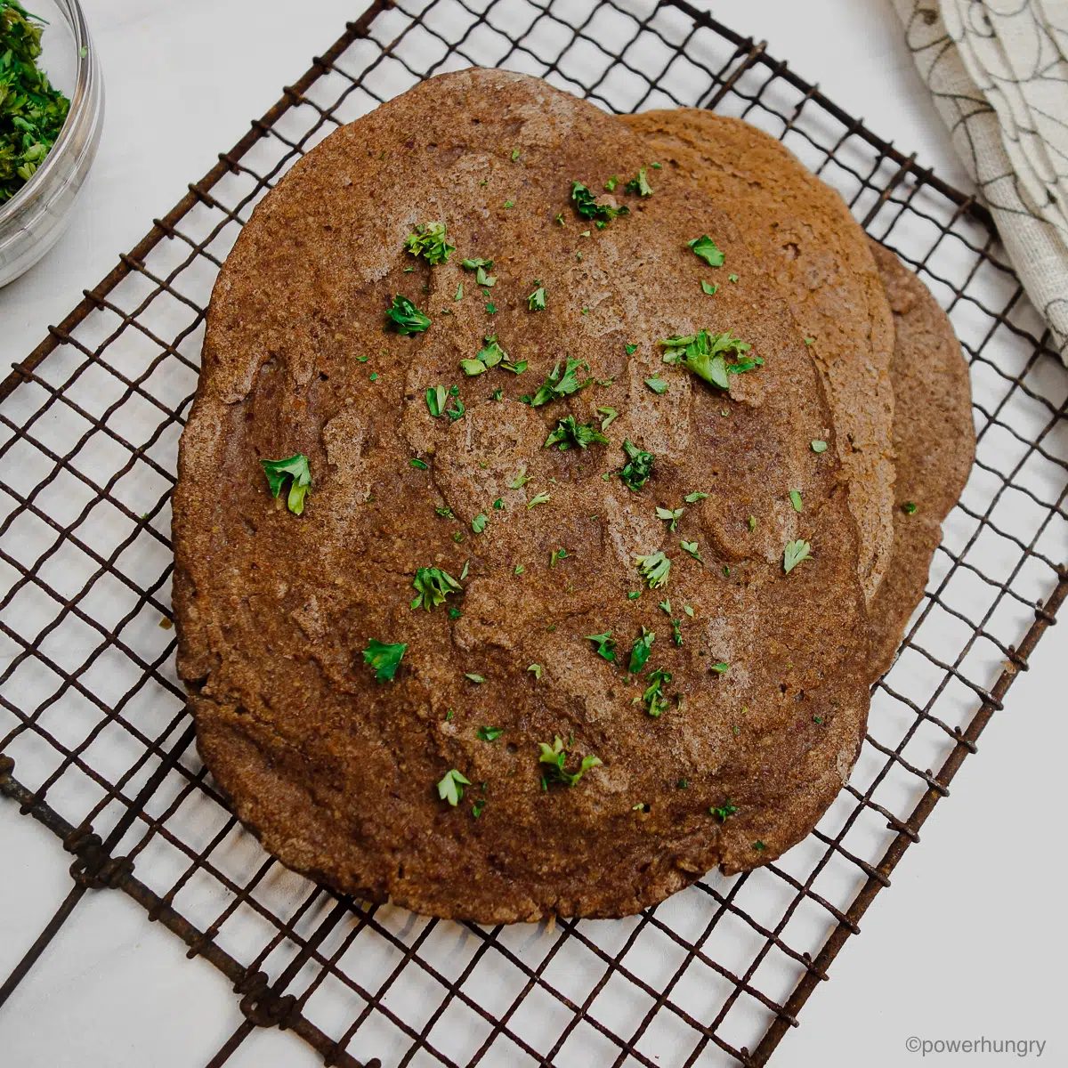 2 ingredient teff naan on a cooling rack