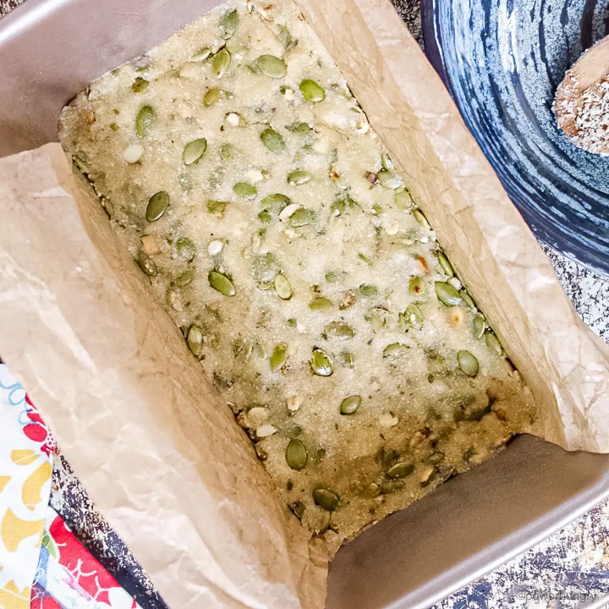 almond granola bars, unbaked , in a pan