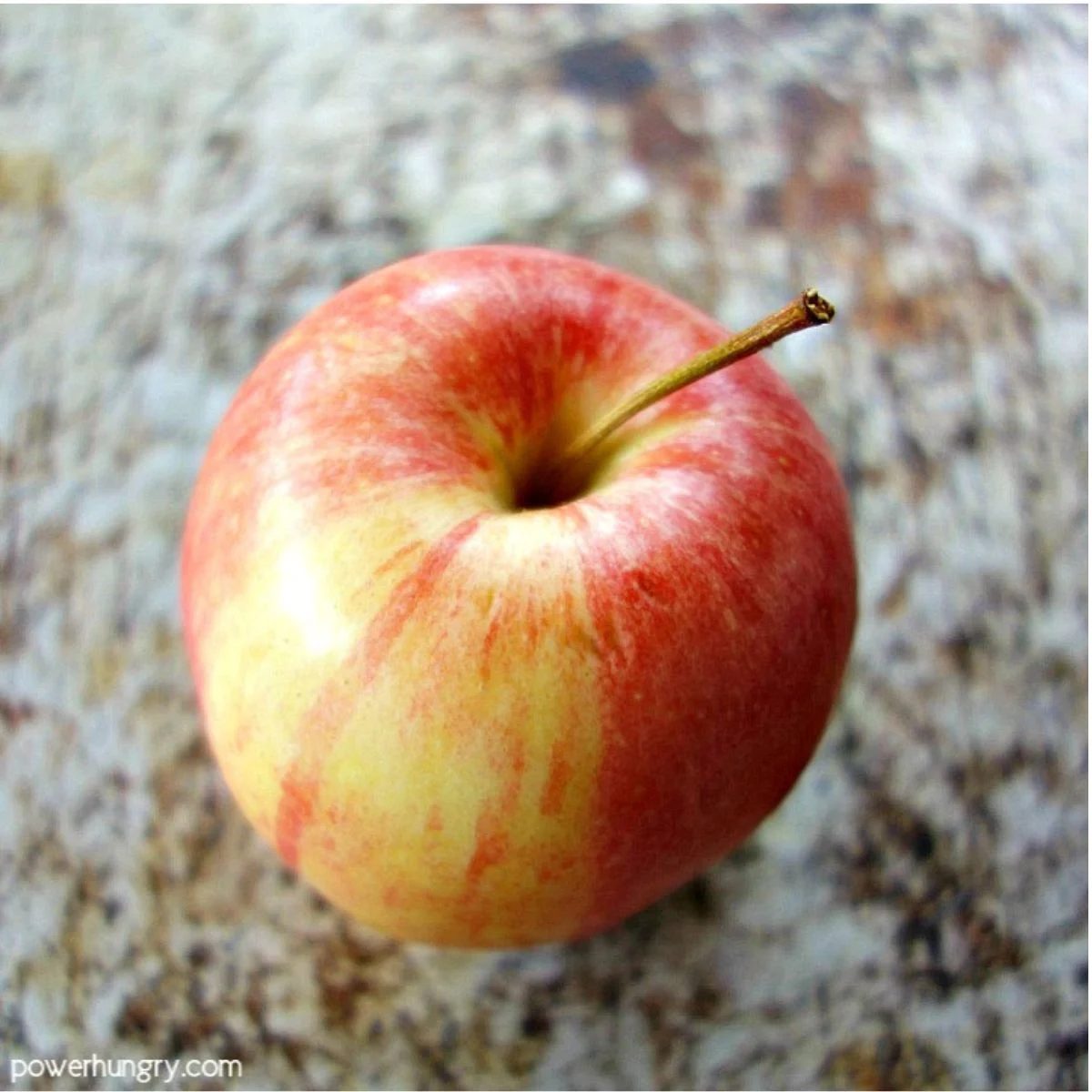 fresh apple on metal background
