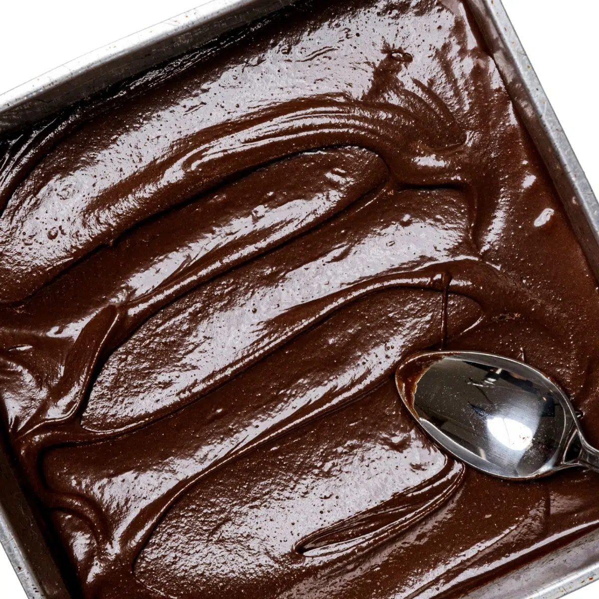 banana fudge brownie batter in a square pan