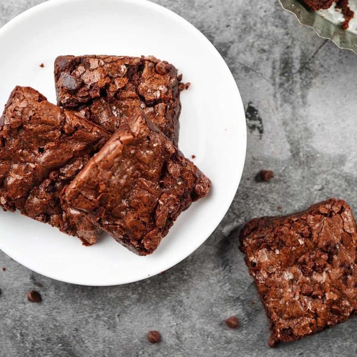 white plate with 3 ingredient banana fudge brownies on top