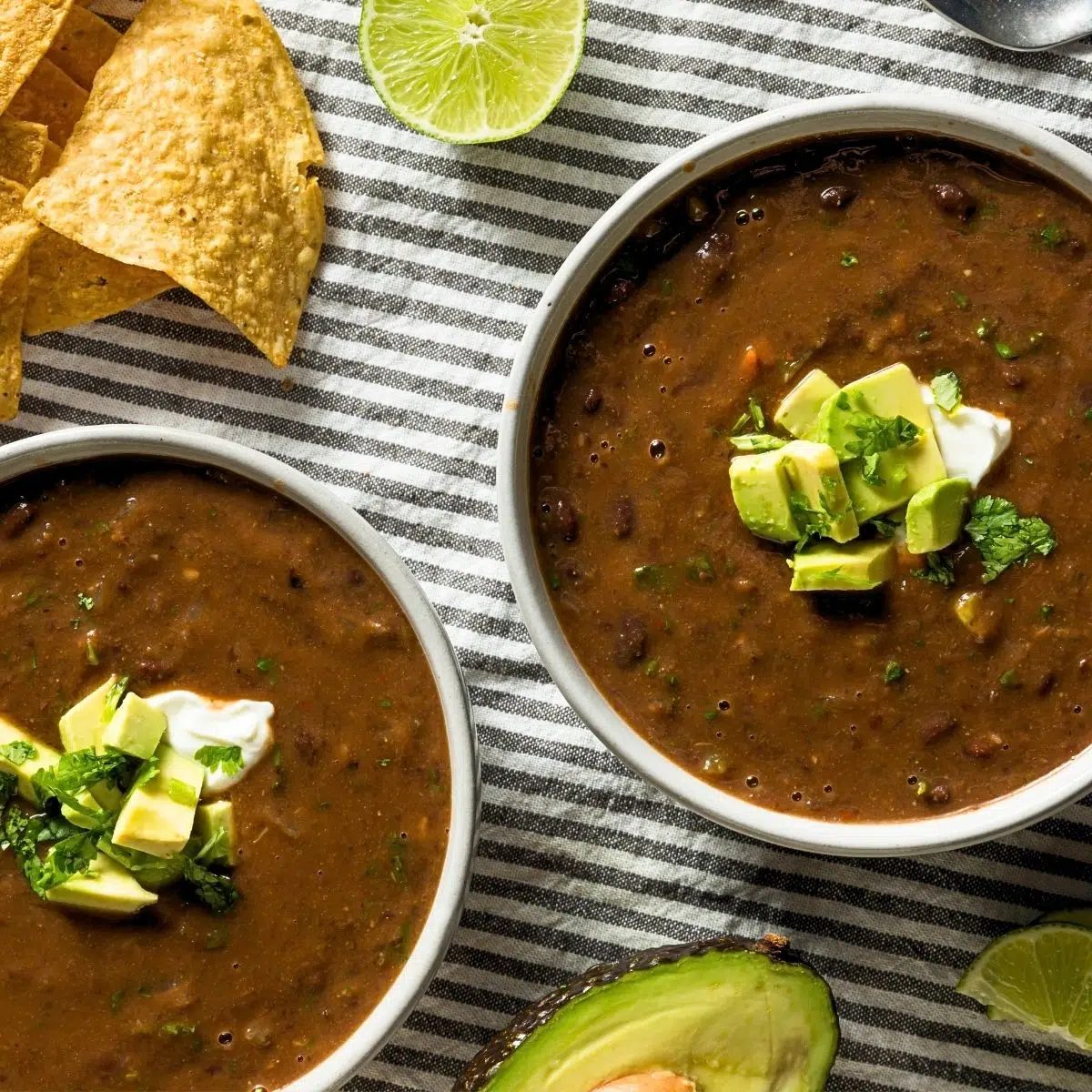 two bowls of black bean pumpkin soup