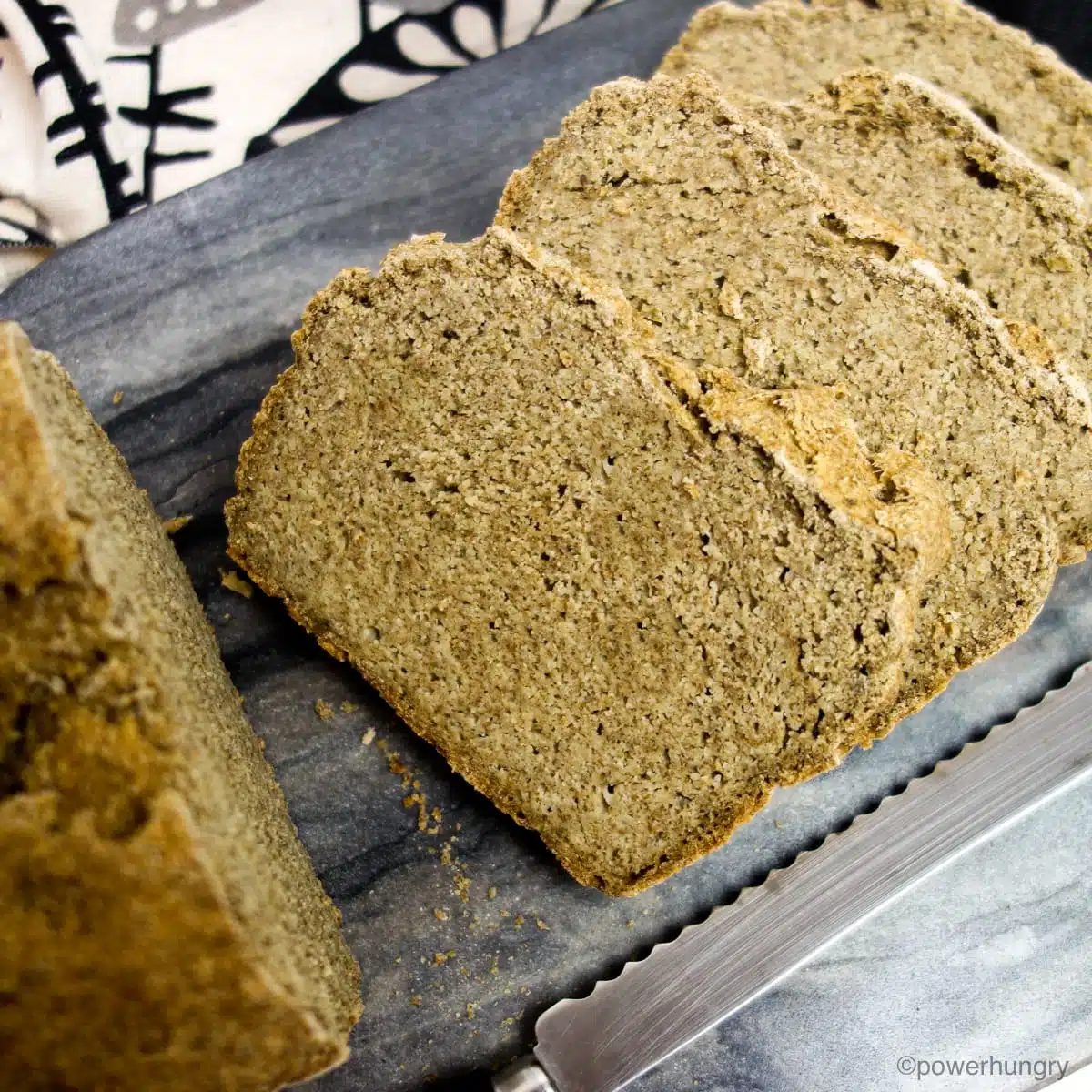 lives of bread on a grey cutting board