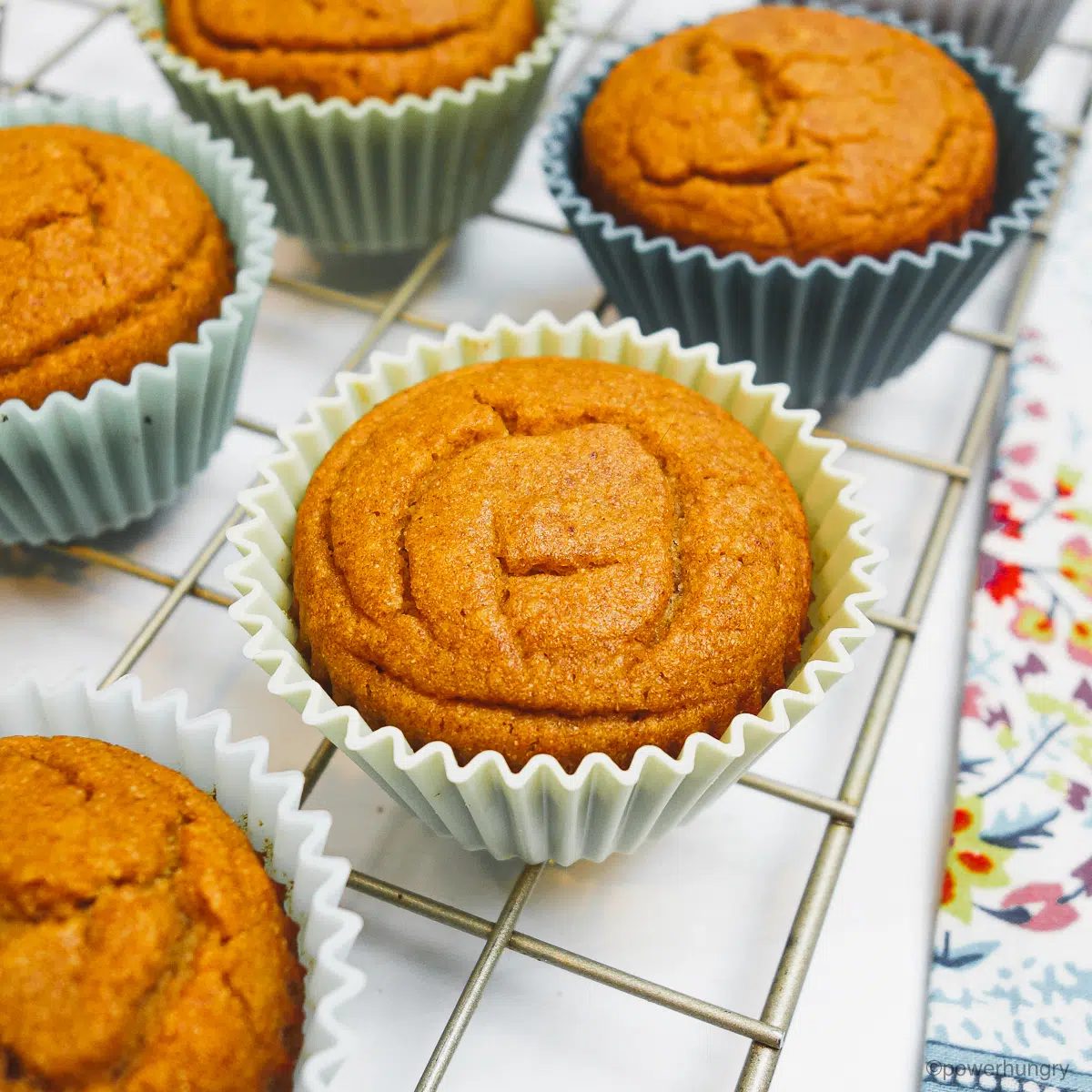 chickpea flour date muffins on a cooling rack