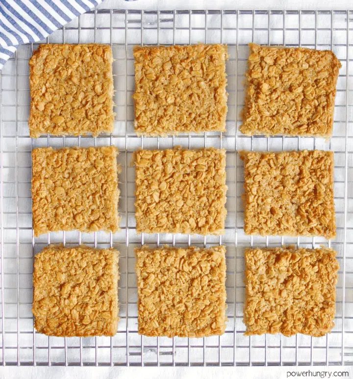 Vegan Coconut Baked Oatmeal Squares, cut, on a wire cooling rack