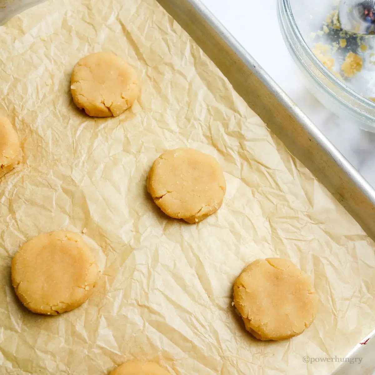 unbaked coconut flour shortbread on a baking sheet