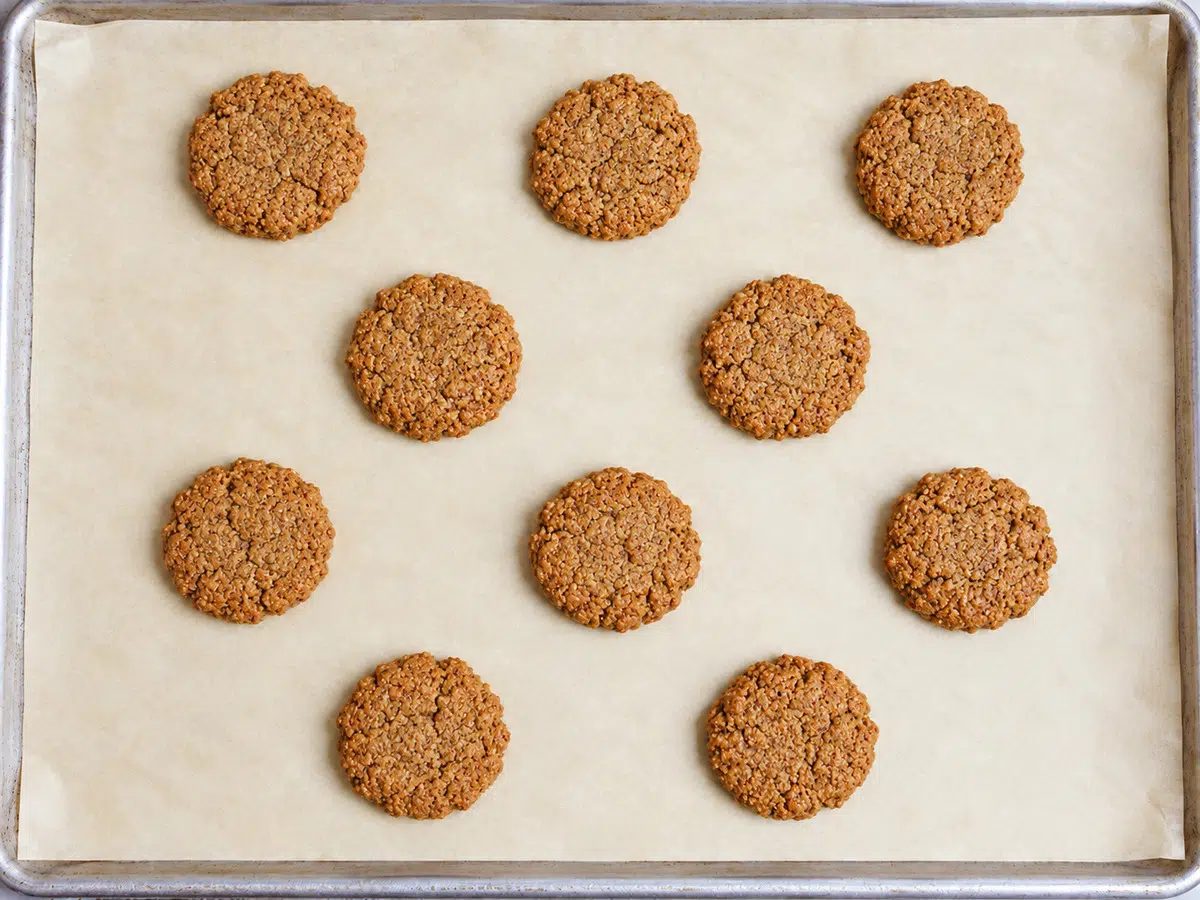 baked 3-ingredient flaxseed cookies on a parchment lined baking sheet