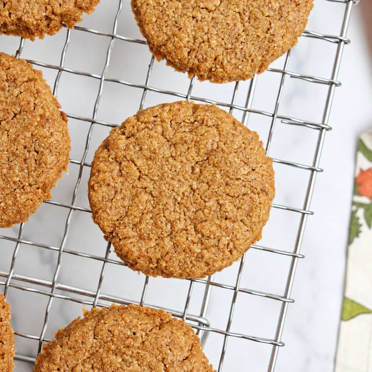 3-ingredient flaxseed cookies cooling on a cooling rack