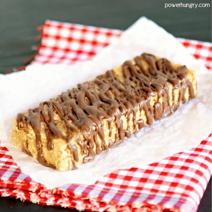3-ingredient keto protein bar on a piece of white parchment paper