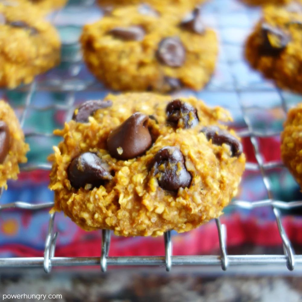 close up of a pumpkin oat cookie on a wire rack