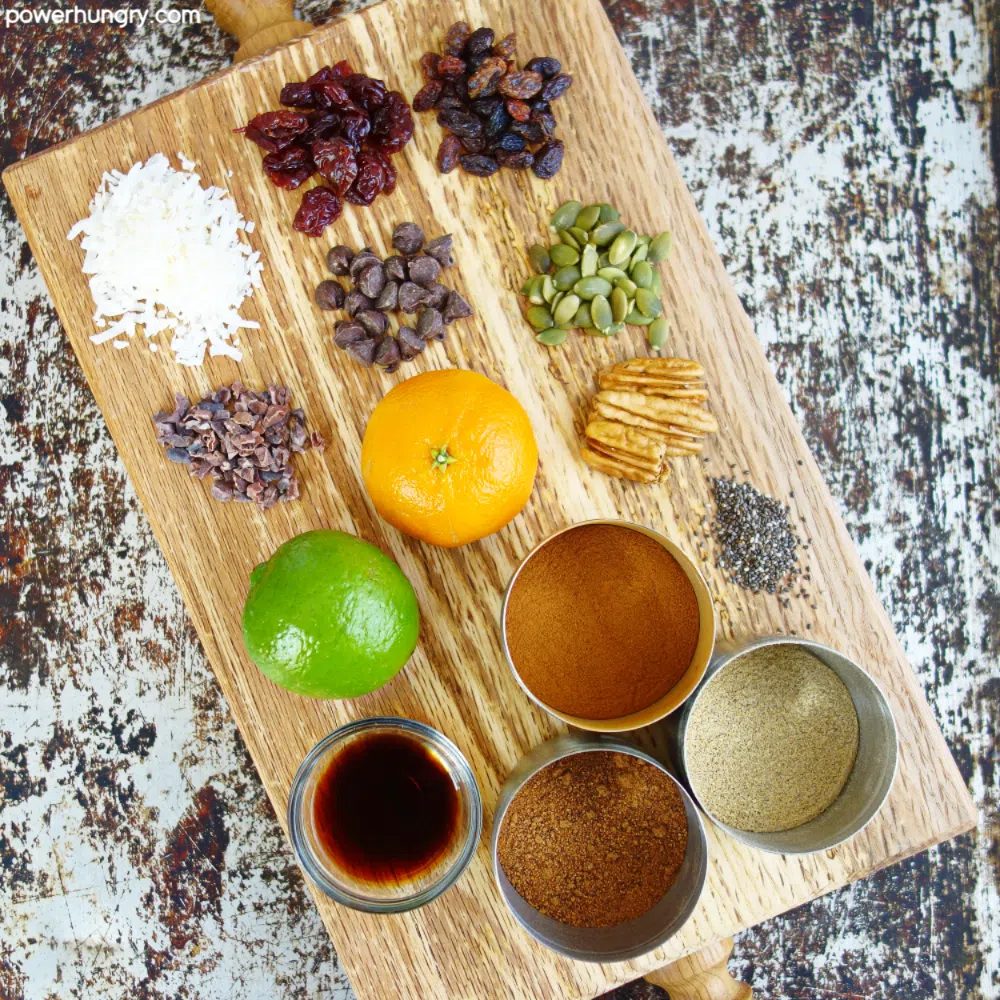 wooden board covered with ingredients for adding to cookies
