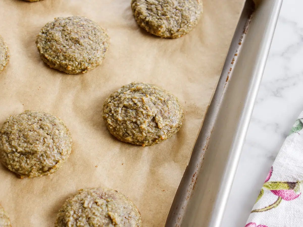 baked pumpkin seed flour banana cookies still on baking sheet