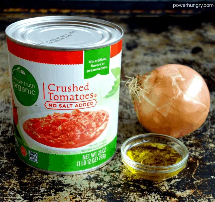 ingredients for 3-ingredient tomato soup on a baking sheet
