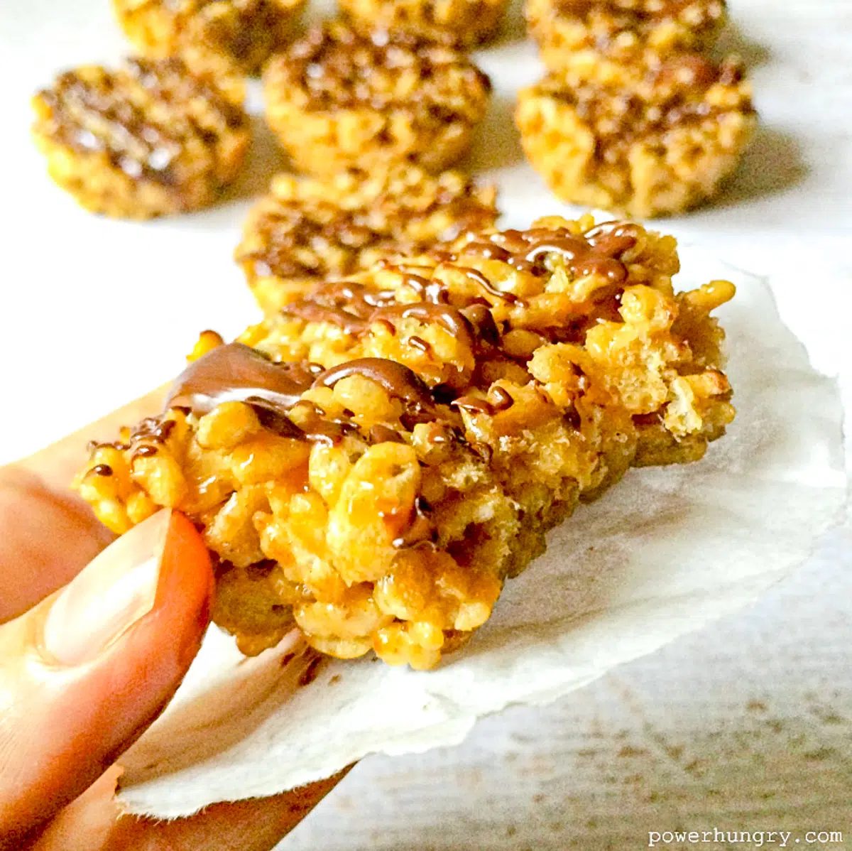 high protein rice crispie treat with a bite taken out