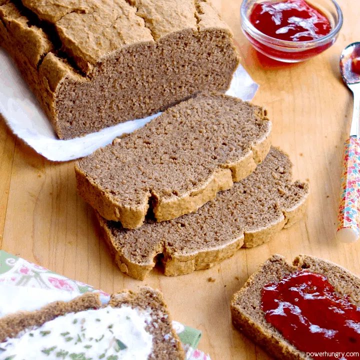 sliced lentil bread on a wooden cutting board