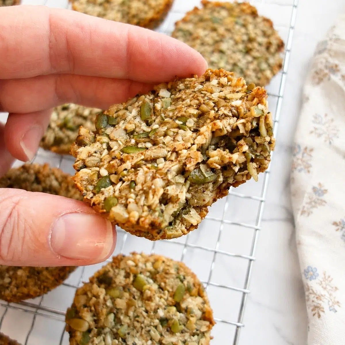 vegan seed cookie with a bite taken out