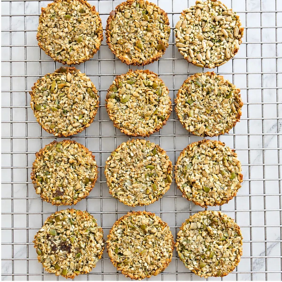 overhead shot of seed cookies on a cooling rack