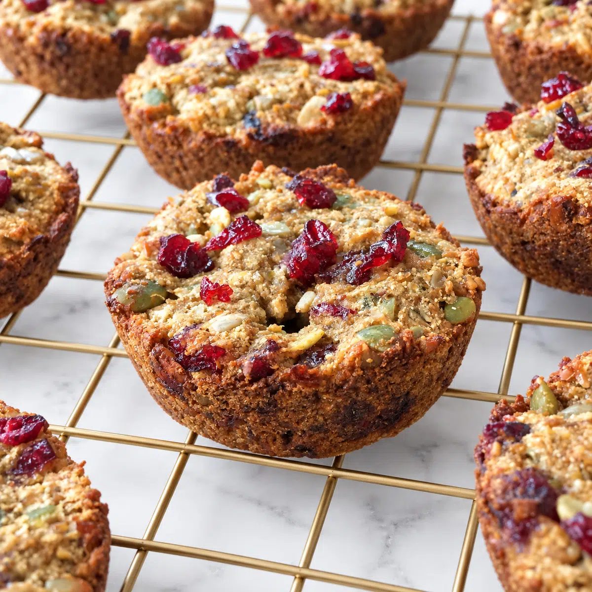 oat-free vegan granola cookies on gold cooling rack