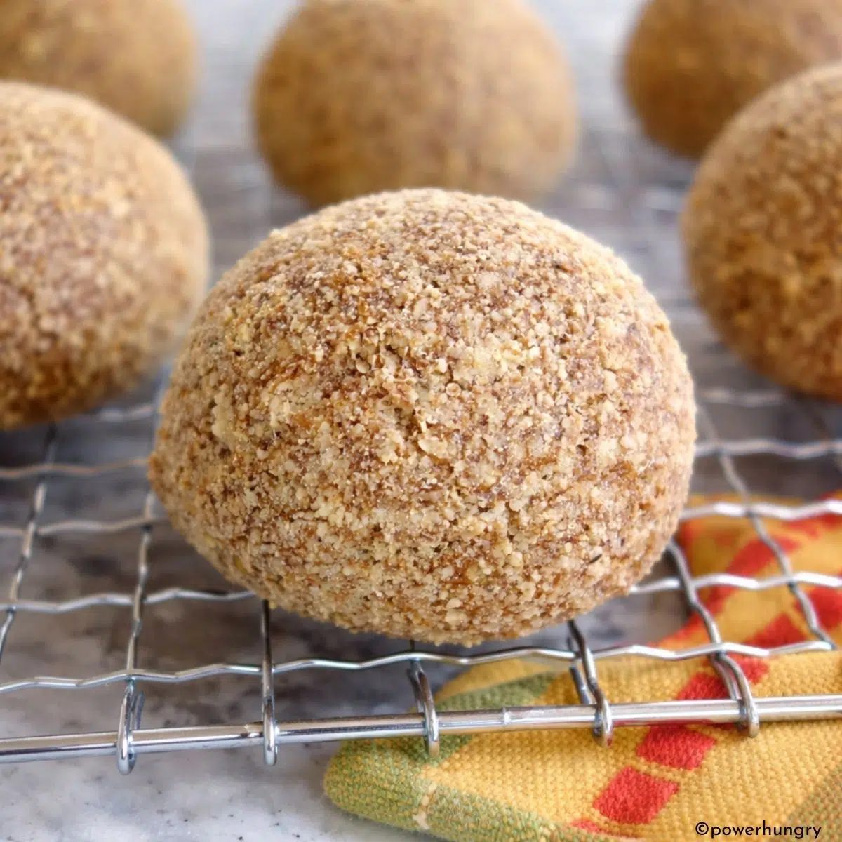 vegan almond flour rolls on a cooling rack