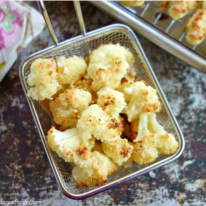 Overhead shot of small basket of cauliflower popcorn