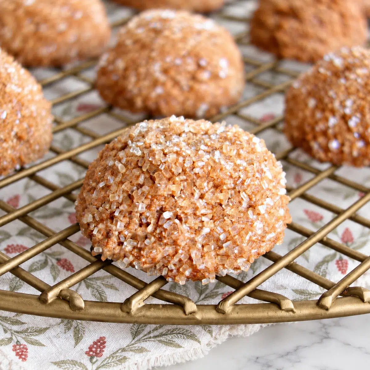 almond flour gingerbread cookies on a cooling rack