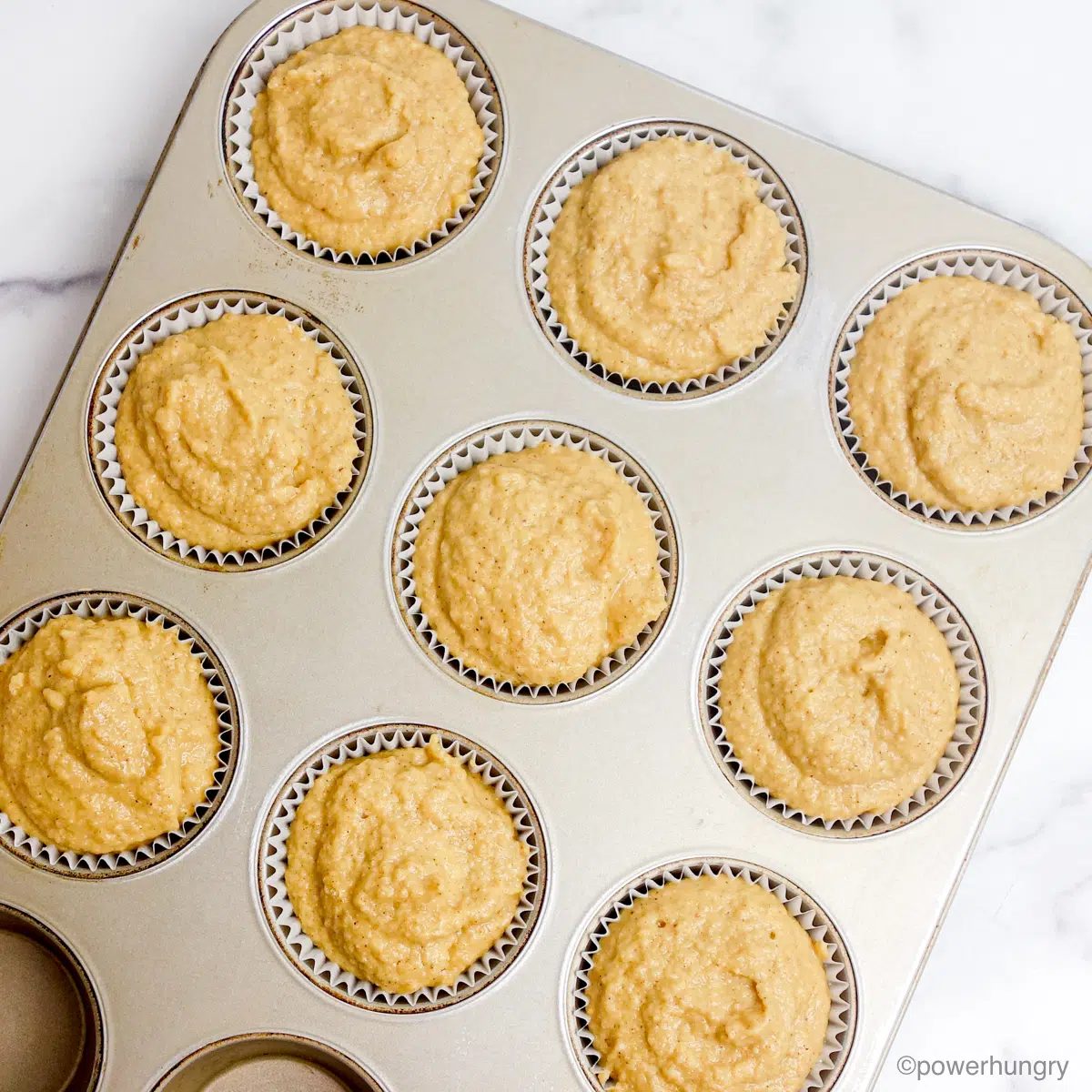 batter in cups for applesauce chickpea flour muffins