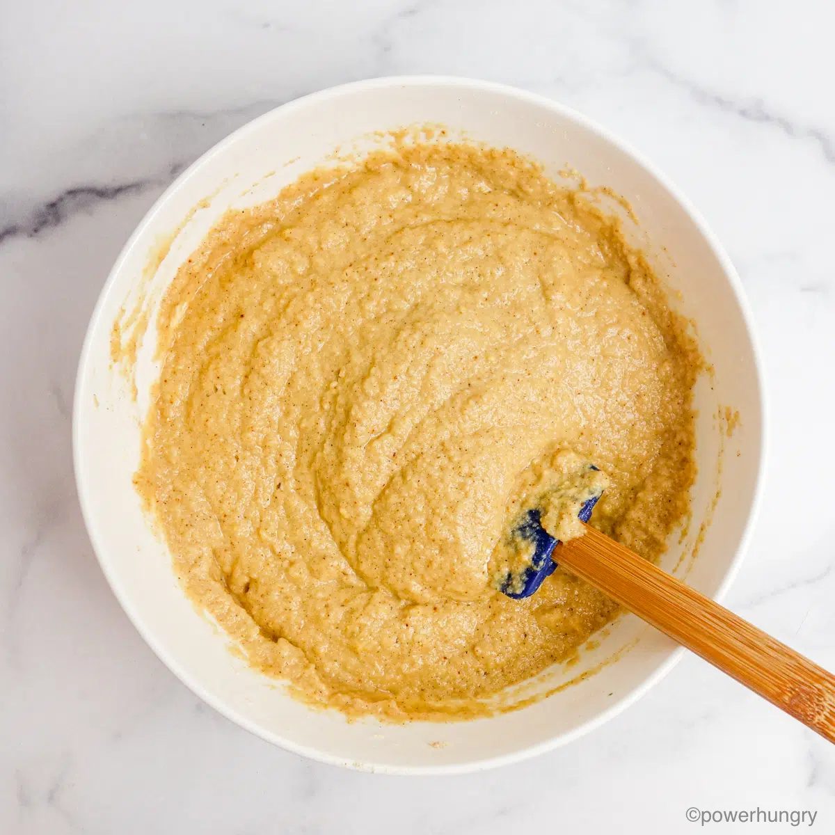 wet ingredients mixed for applesauce chickpea flour muffins