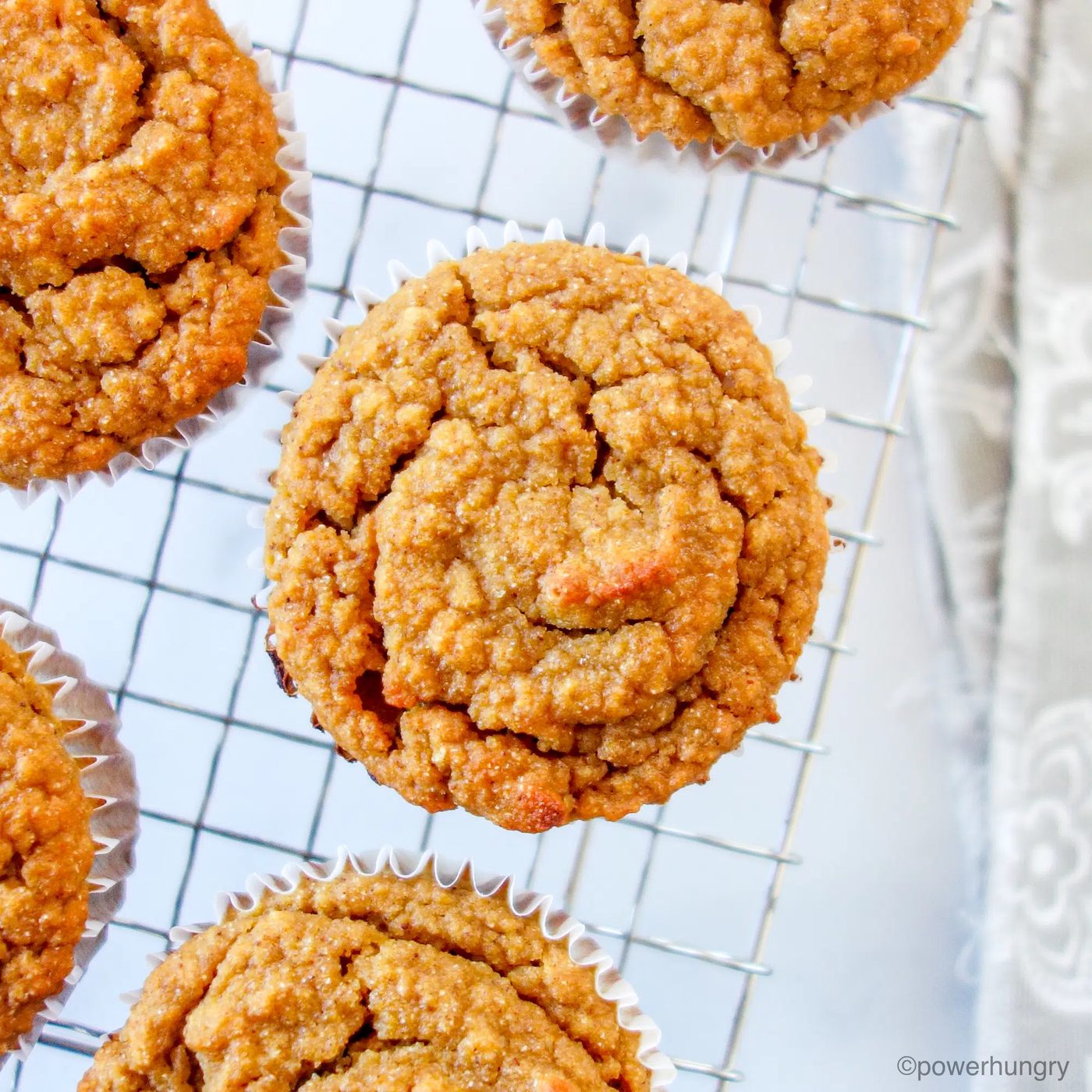 applesauce chickpea flour muffins cooling on rack