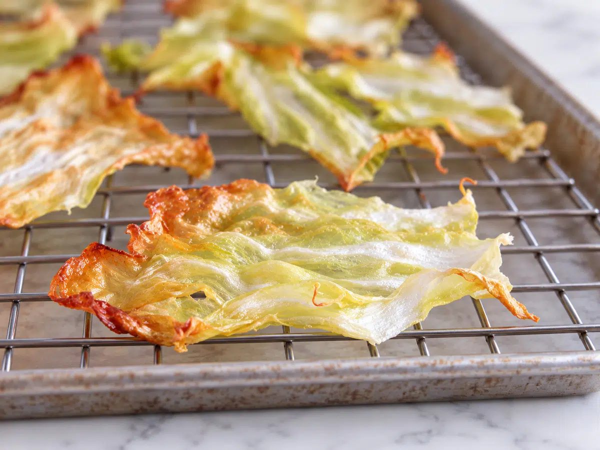 crispy cabbage chips close-up on rack