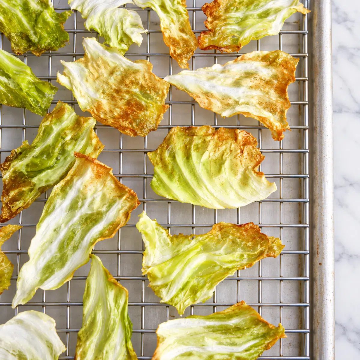 crispy cabbage chips baked on wire rack