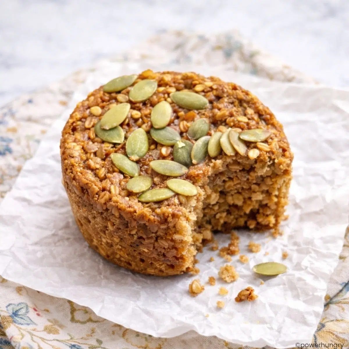 pumpkin steel cut oats cup, with a bite taken out