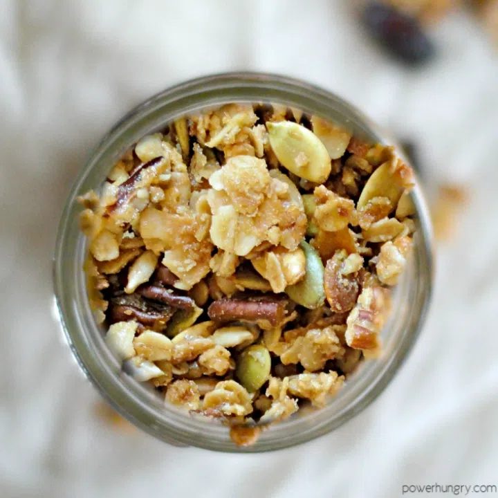 overhead shot of high protein banana bread granola in a glass jar