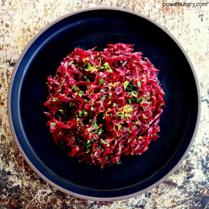overhead shot of fresh beet salad on a slate plate