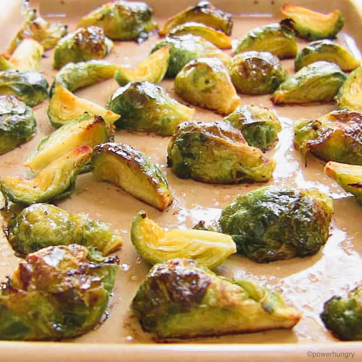 roasted Brussels sprouts on an earthenware baking sheet