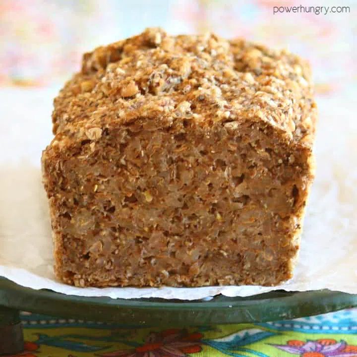 small loaf of 4-ingredient buckwheat bread, sliced to expose interior texture