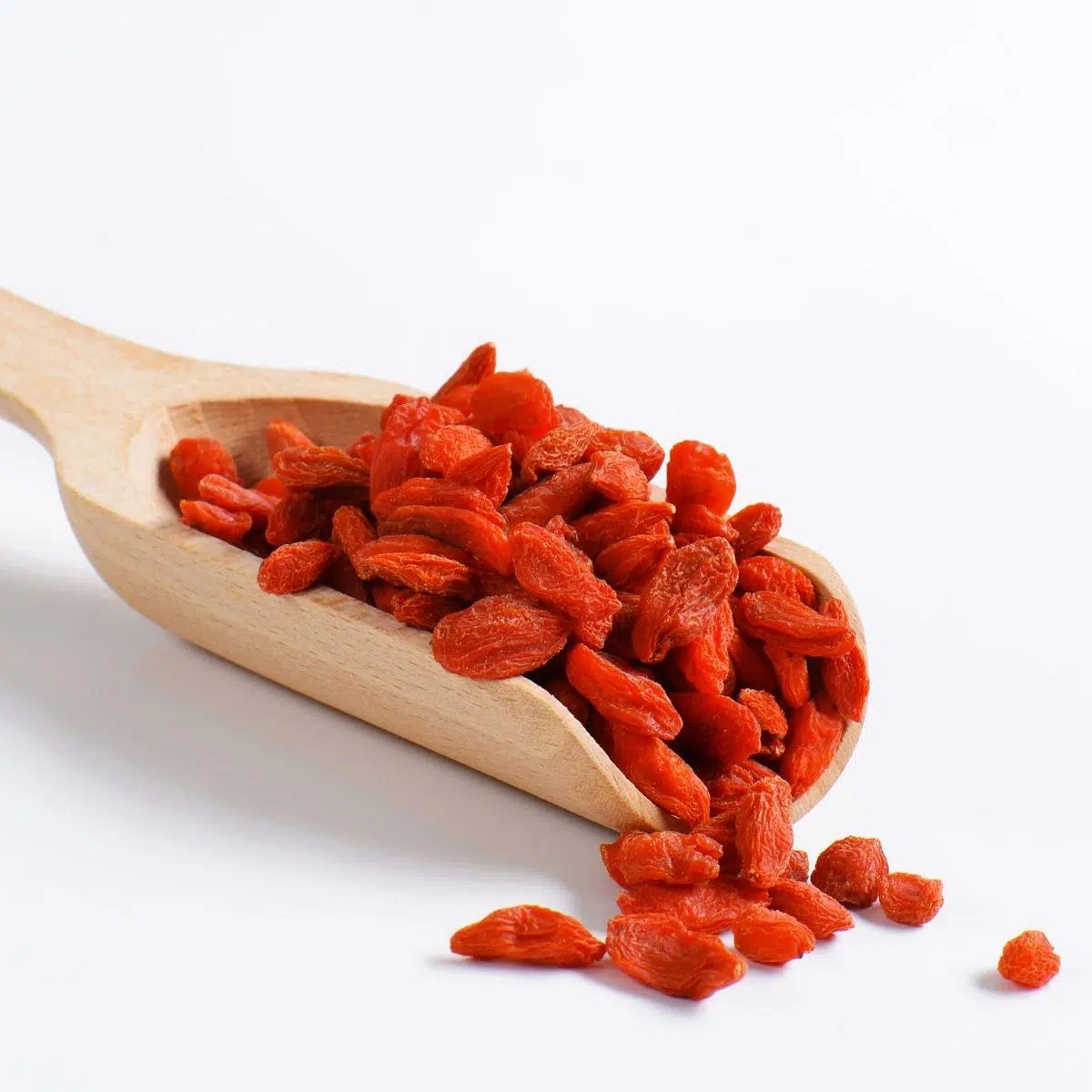 wooden scoop with goji berries