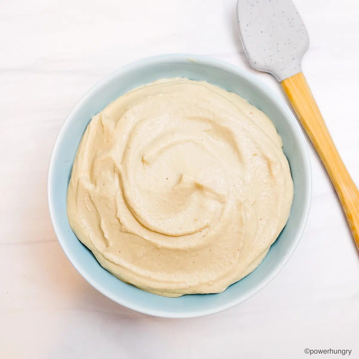 cashew whipped cream in a light blue bowl