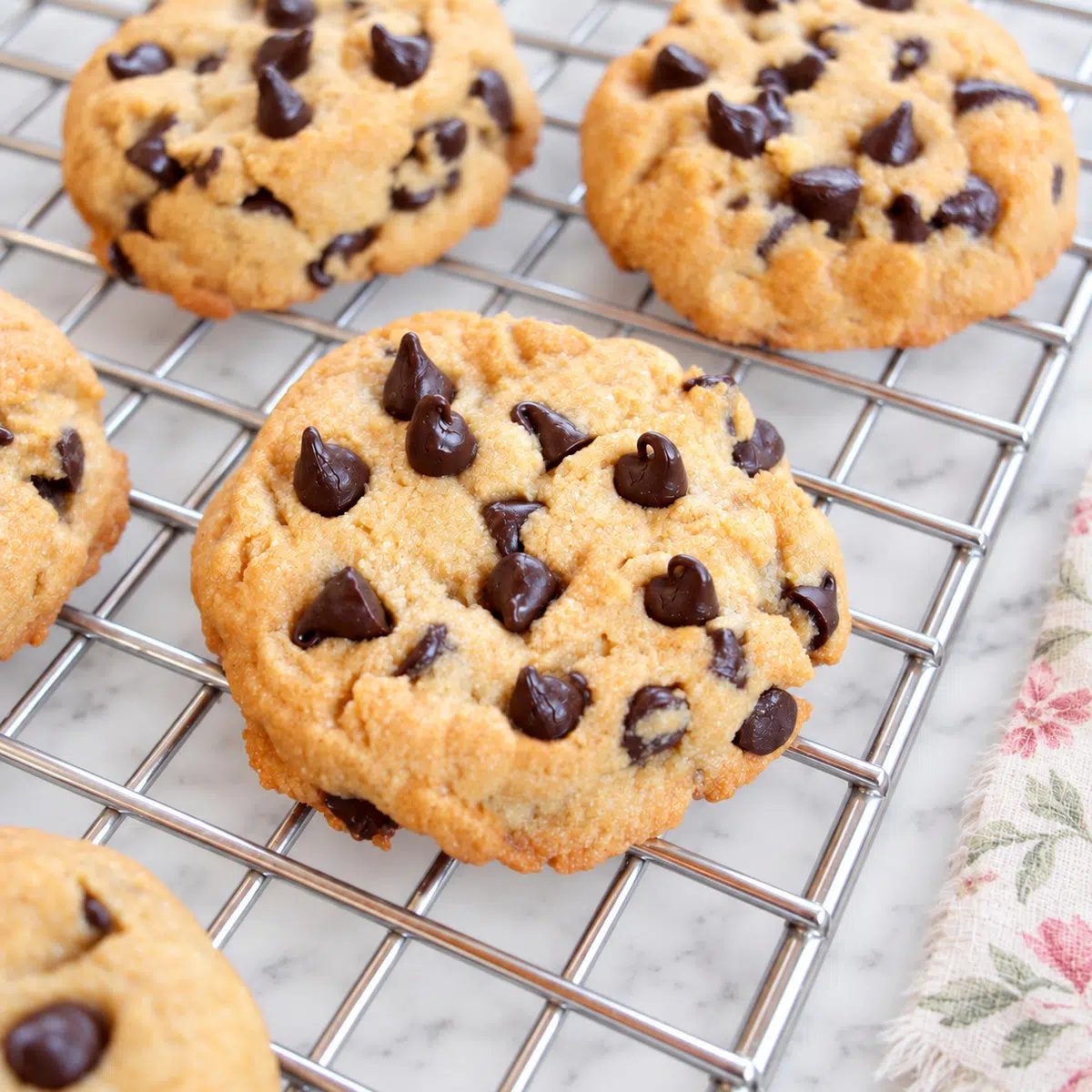 closeup of cassava flour cookies cooling on a cooling rack