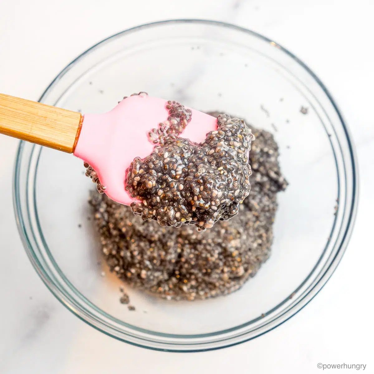 a glass bowl filled with gelled chia seeds
