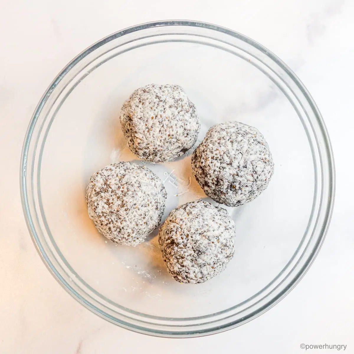 chia tortilla dough shaped into 4 balls
